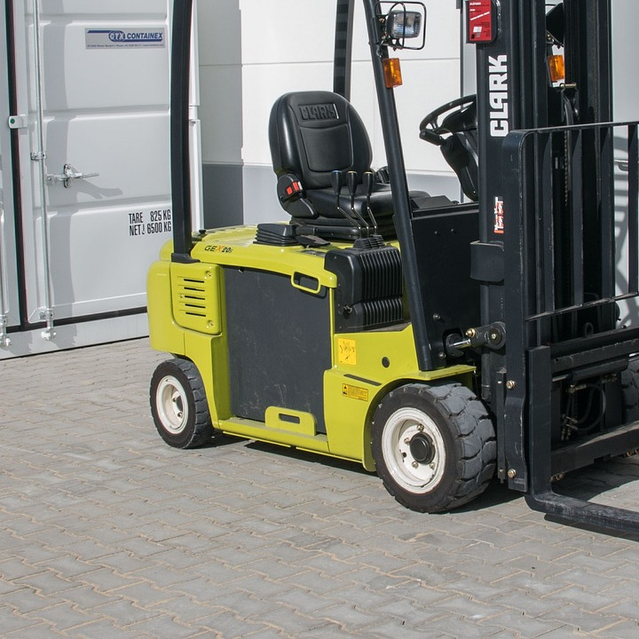 forklift moving pallets warehouse